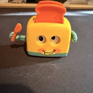 Vintage TOMY TOASTER WIND-UP TOY MADE IN SINGAPORE
